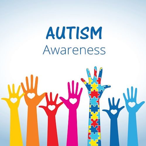 image of drawn hands raised with the words autism awareness